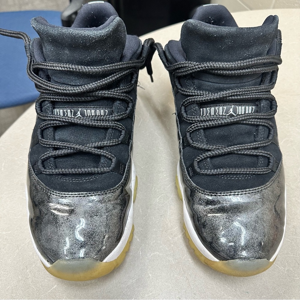 Jordan 11 Black and White Sneakers with Gold Accents - Picture 2 of 10